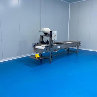 Cinta de envasado de pescado y marisco con dosificador automatico